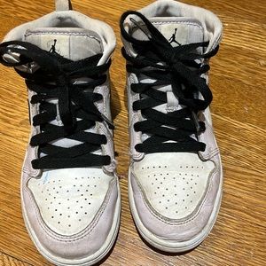 Selling Nike Air Jordans Purple, white, and black girls shoes